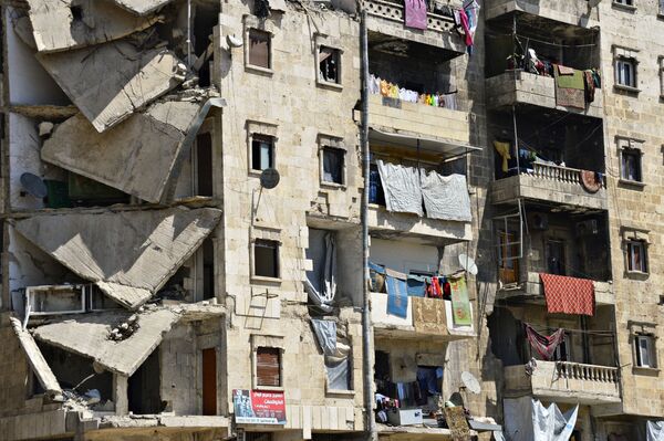 سكان حي صلاح الدين في حلب السورية يعودون إلى بيوتهم - سبوتنيك عربي