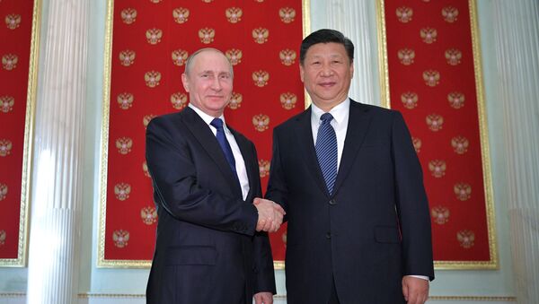 الرئيس الروسي فلاديمير بوتين مع الرئيس الصيني شي جين بينغ - سبوتنيك عربي