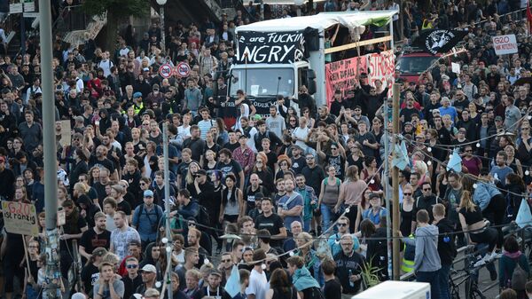 تظاهرات ضد قمة مجموعة العشرين في هامبورغ، ألمانيا  يوليو/ تموز 2017 - سبوتنيك عربي