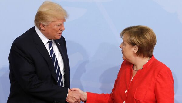 قمة مجموعة العشرين في هامبورغ، ألمانيا - المستشارة الألمانية أنجيلا ميركل تلتقي بالرئيس الأمريكي دونالد ترامب، 7 يوليو/ تموز 2017 - سبوتنيك عربي