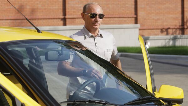 بوتين خلال قيادته السيارة - سبوتنيك عربي