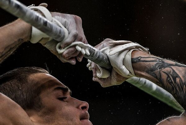 جائزة ستينين للتصوير المحترف في فئة الرياضة - صورة للمصور أليكسي فيليبوف بعنوان على أطراف الأصابع (صورة للرياضي الأذربيجاني أوليغ ستيبكو خلال الألعاب الأولمبية في ريو دي جانيرو) - سبوتنيك عربي