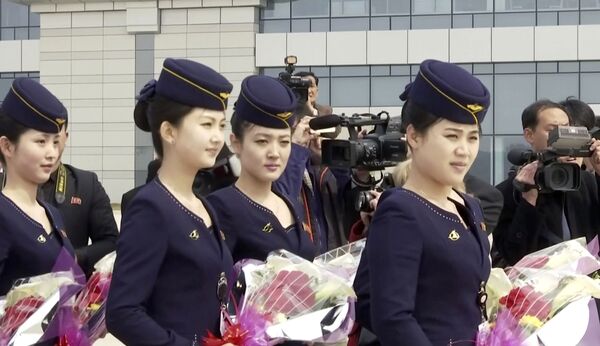 مضيفات الطيران الكوري الشمالي آير كوريو (Air Koryo) في بيونغ يانغ - سبوتنيك عربي