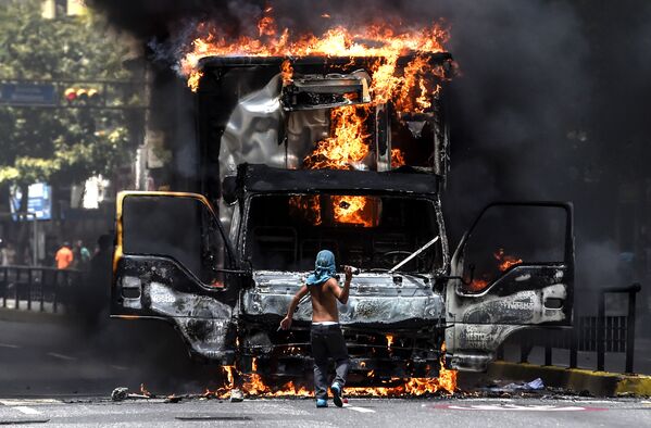 استمرار المظاهرات في كاراكاس، فنزويلا 18 يوليو/ تموز 2017 - سبوتنيك عربي