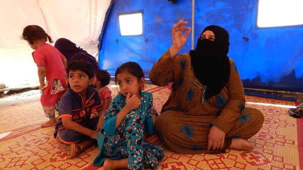 عائلات الدواعش من وهم الخلافة إلى خيام الإيواء في صحراء الموصل - سبوتنيك عربي