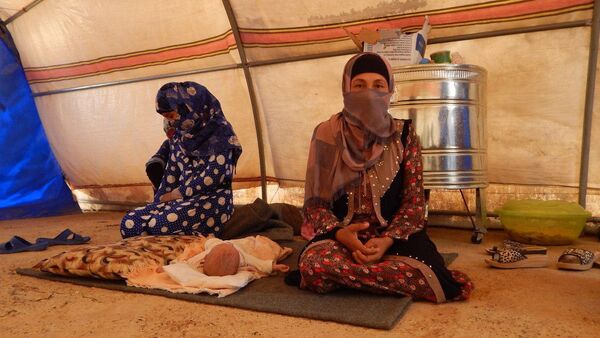 عائلات الدواعش من وهم الخلافة إلى خيام الإيواء في صحراء الموصل - سبوتنيك عربي