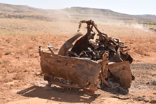 آليات مدمرة في جرود عرسال آليات مدمرة في جرود عرسال - سبوتنيك عربي
