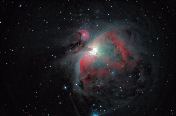 القائمة القصيرة لمسابقة التصوير الفلكي الدولية أستروفوتوغروفي (Insight Astronomy Photographer of the Year)  الذي يبعد 1300 سنة ضوئية عن كوكب الأرض لعام 2017 - صورة لـ سديم أوريون الغازي (Orion's Gaseous Nebula) للمصور سيباستيان غريتش - سبوتنيك عربي