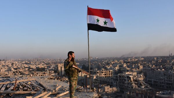 جندي من الجيش السوري في مدينة حلب - سبوتنيك عربي