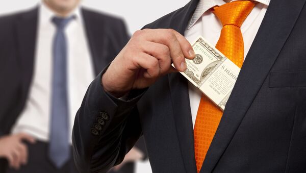 رجل أعمال يضع المال في جيبه - سبوتنيك عربي
