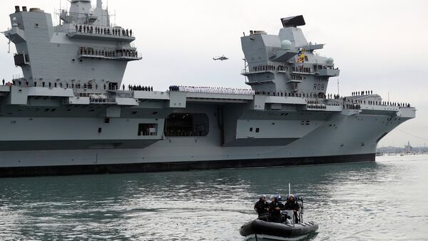 The Royal Navy's new aircraft carrier HMS Queen Elizabeth arrives in Portsmouth, Britain August 16, 2017 - سبوتنيك عربي