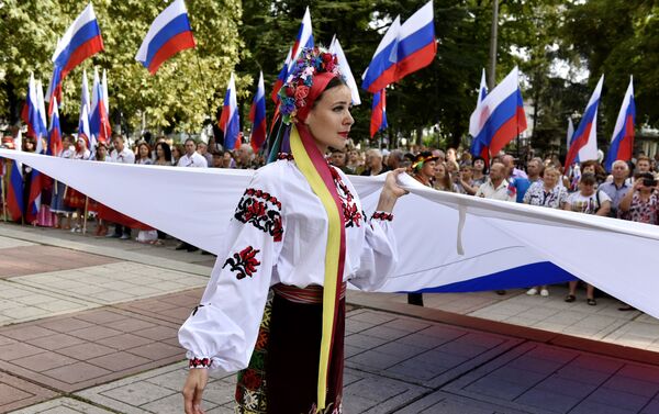 يوم العلم الوطني لروسيا في سيمفيروبل - سبوتنيك عربي