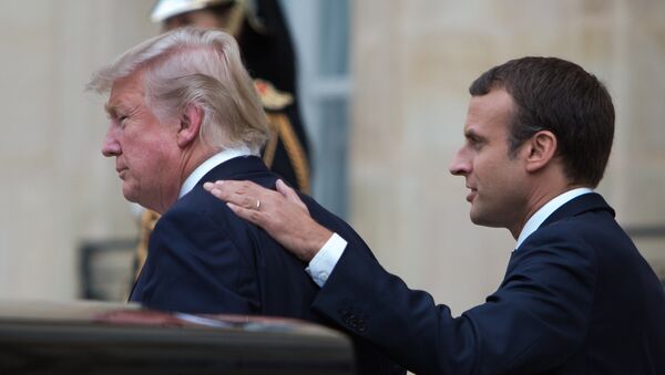 الرئيس الفرنسي إيمانويل ماكرون والرئيس الأمريكي دونالد ترامب في باريس، فرنسا - سبوتنيك عربي