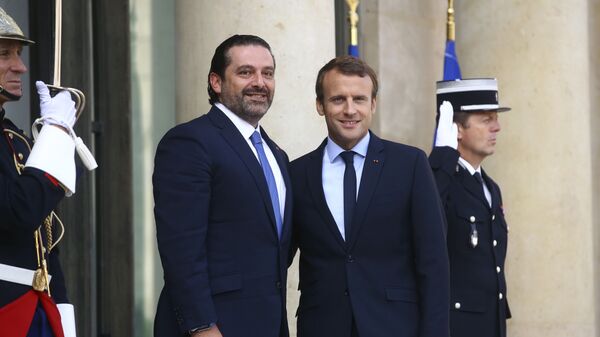 الرئيس الفرنسي إيمانويل ماكرون  ورئيس الوزراء اللبناني سعد الحريري في باريس، فرنسا 1 سبتمبر/ أيلول 2017 - سبوتنيك عربي