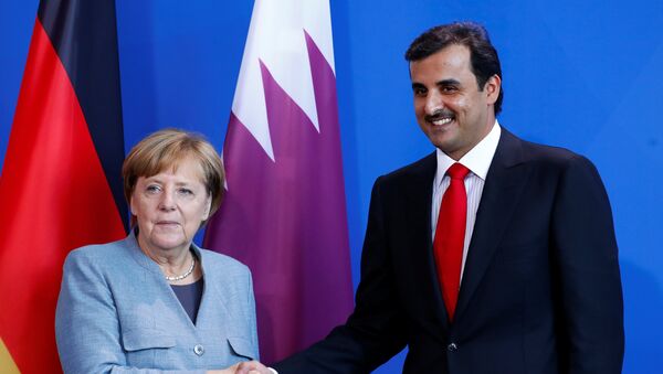 المستشلرة الألمانية أنغيلا ميركل و أمير قطر  - سبوتنيك عربي