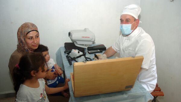 المساعدات الطبية لأهالي دير الزور - سبوتنيك عربي