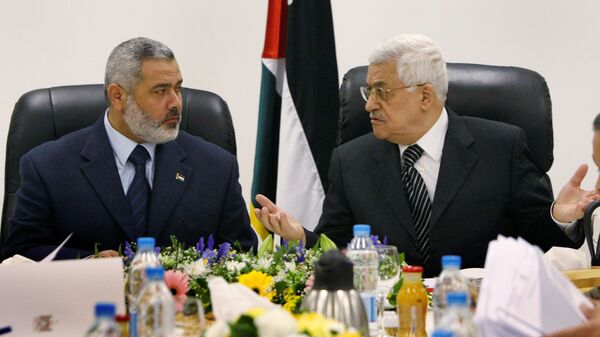 الرئيس الفلسطيني محمود عباس والأمين العام لحركة حماس إسماعيل هنية - سبوتنيك عربي
