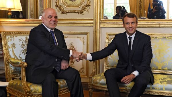 الرئيس الفرنسي إيمانويل ماكرون ورئيس وزراء العراق حيدر العبادي - سبوتنيك عربي