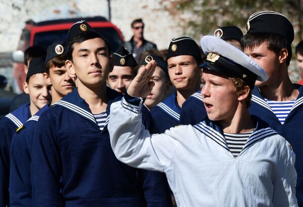 مشاركون في فعالية يوم الالتحاق بالجيش في فلاديفوستوك، روسيا - سبوتنيك عربي