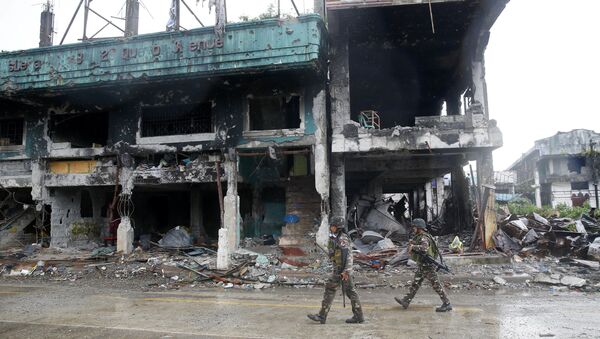 آثار الدمار في مدينة مراوي، بعد معارك شرسة ضد إرهابيي تنظيم داعش، الفلبين 25 أكتوبر/ تشرين الأول 2017 - سبوتنيك عربي