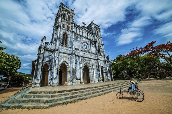 مسابقة التصوير التاريخي لهذا العام (Historic Photographer of the Year) - صورة بعنوان كنيسة مانغ لانغ، فيتنام، للمصور تران هانغ داو - سبوتنيك عربي