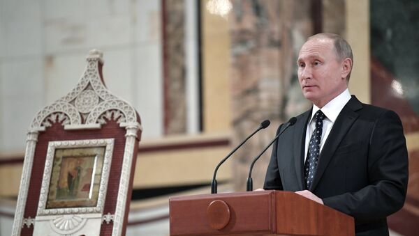 الرئيس الروسي فلاديمير بوتين خلال كلمته أمام مجلس الأساقفة في الكنيسة الكاتدرائية الأرثوذكسية الروسية - سبوتنيك عربي
