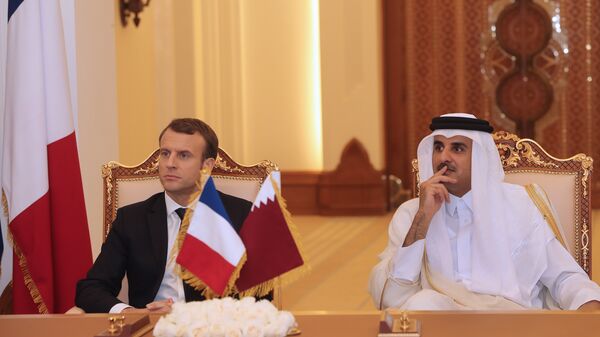 الرئيس الفرنسي امانويل ماكرون وأمير دولة قطر الشيخ تميم بن حمد آل ثاني - سبوتنيك عربي
