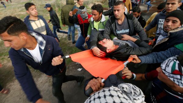 إصابات بين الفلسطينيين في قطاع غزة - سبوتنيك عربي