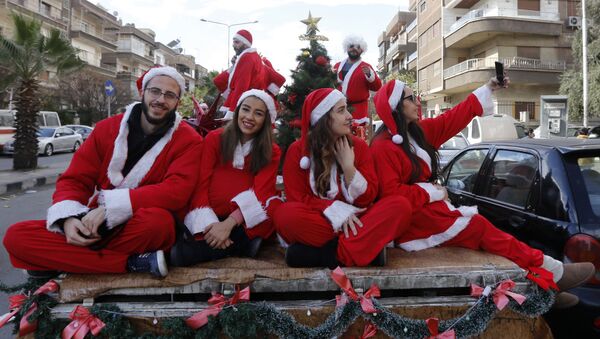 الاحتفالات بعيد الميلاد المجيد - دمشق، سوريا 24 ديسمبر/ كانون الأول 2017 - سبوتنيك عربي