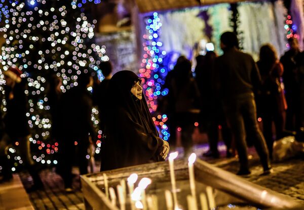 الاحتفالات بعيد الميلاد المجيد - اسطنبول، تركيا 24 ديسمبر/ كانون الأول 2017 - سبوتنيك عربي