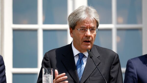 Italian Foreign Minister Paolo Gentiloni attends a press conference after a foreign minister meeting of the EU founding members in Berlin, Germany, June 25, 2016 - سبوتنيك عربي