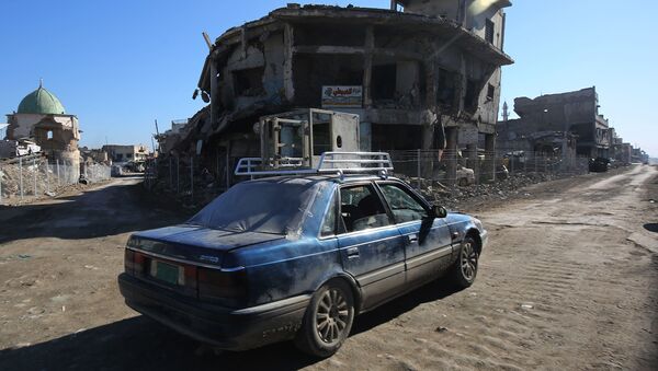 حجم الدمار في أحدى شوارع الموصل بعد تحريرها من داعش - سبوتنيك عربي