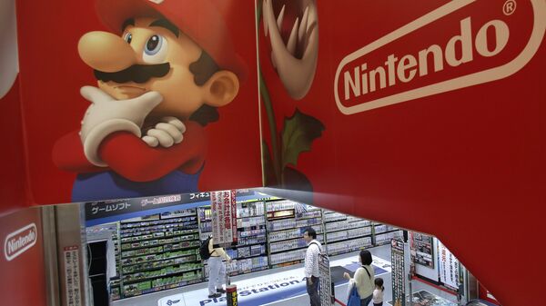 Logo of Nintendo and Super Mario characters at an electronics store in Tokyo. (File) - سبوتنيك عربي