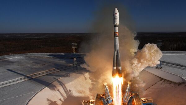 إطلاق الصاروخ الروسي سويوز أ 2.1 مع 11 قمرا صناعيا - سبوتنيك عربي