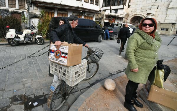 وفد من الشخصيات الدينية في روسيا يزور دمشق - توزيع المساعدات الإنسانية - سبوتنيك عربي