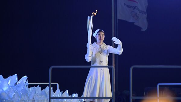 إشعال الشعلة الأولمبية - مراسم افتتاح دورة الألعاب الأولمبية الشتوية الـ 23 في بيونغ تشانغ، كوريا الجنوبية - سبوتنيك عربي