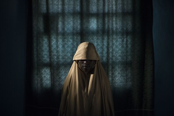 مسابقة صور الصحافة العالمية لعام 2018 - صورة بعنوان بوكو حرام وحزام الانتحاري للمصور آدم فيرغوسن، في فئة التصوير صورة الصحافة العالمية لهذا العام - سبوتنيك عربي