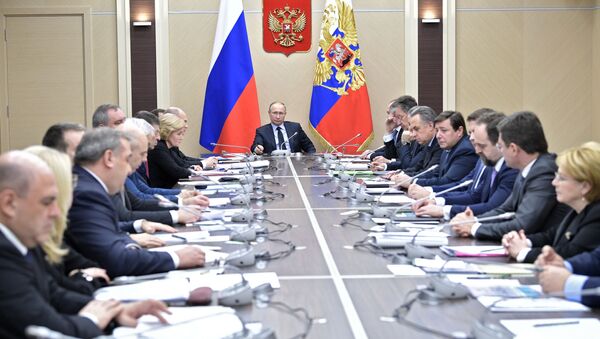 الرئيس فلاديمير بوتين خلال الاجتماع مع أعضاء مجلس الأمن الروسي، 31 يناير/ كانون الثاني 2018 - سبوتنيك عربي