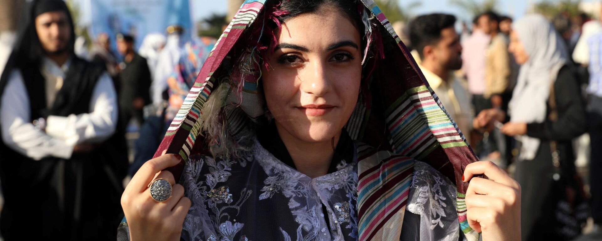 إحدى المشاركات في المهرجان الوطني للزي التقليدي في طرابلس، ليبيا 13 ماري/ آذار 2018 - سبوتنيك عربي, 1920, 18.05.2021