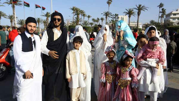 المشاركون في المهرجان الوطني للزي التقليدي في طرابلس، ليبيا 13 ماري/ آذار 2018 - سبوتنيك عربي