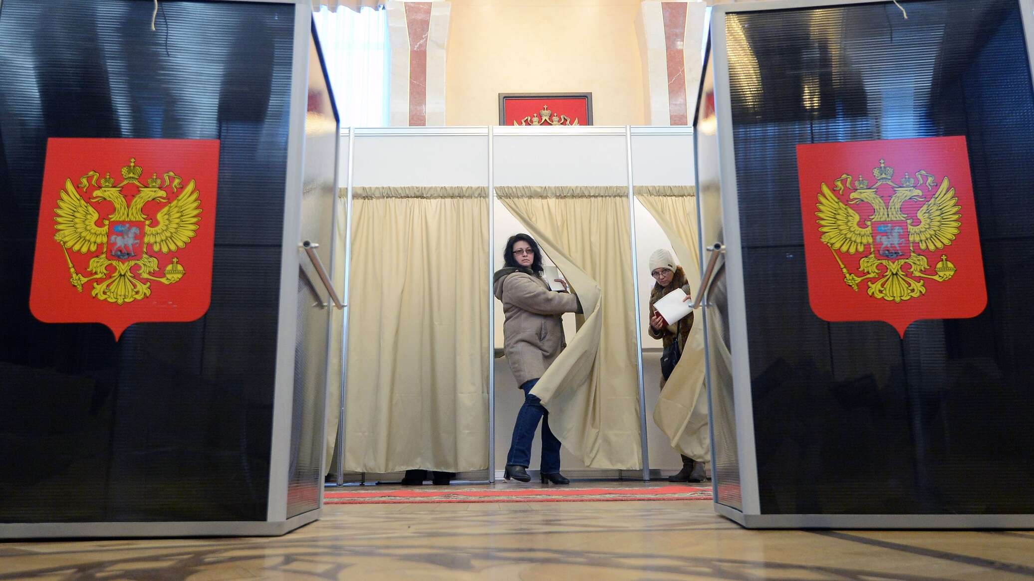 افتتاح مراكز الاقتراع للانتخابات الرئاسية الروسية لليوم الأول في موسكو