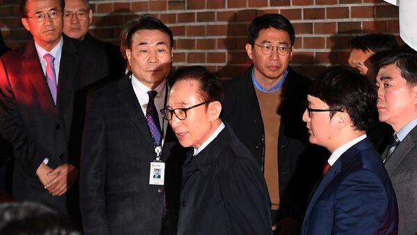 الرئيس الكوري الأسبق أثناء اقتياده للسجن 22 مارس/ آذار 2018 - سبوتنيك عربي