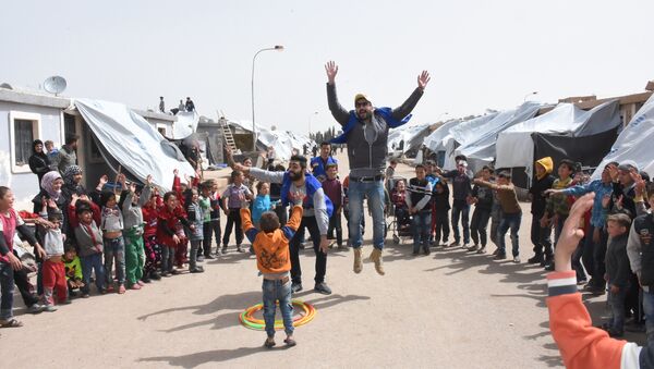 مفاجأة أطفال الغوطة الشرقية في حرجلة - سبوتنيك عربي