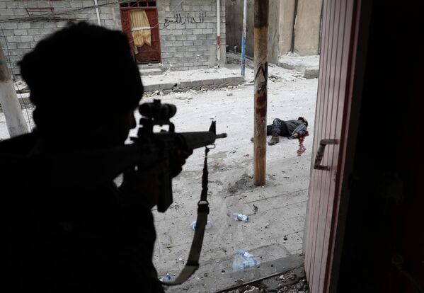 مسابقة صور الصحافة العالمية لعام 2018 - صورة بعنوان أزمة الشرق الأوسط العراق الموصل للمصور غوران توماسيفيتش من صربيا، الفائزة بالمرتبة الثالثة في فئة التصوير أخبار الحدث - سبوتنيك عربي
