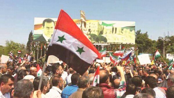 السوريون يحتفلون بالانتصار بعد الضربة الأمريكية - سبوتنيك عربي