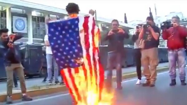 إحراق العلم الأمريكي - سبوتنيك عربي