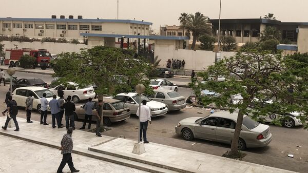 الهجوم الإرهابي على مقر مفوضية الانتخابات، بالعاصمة الليبية طرابلس - سبوتنيك عربي