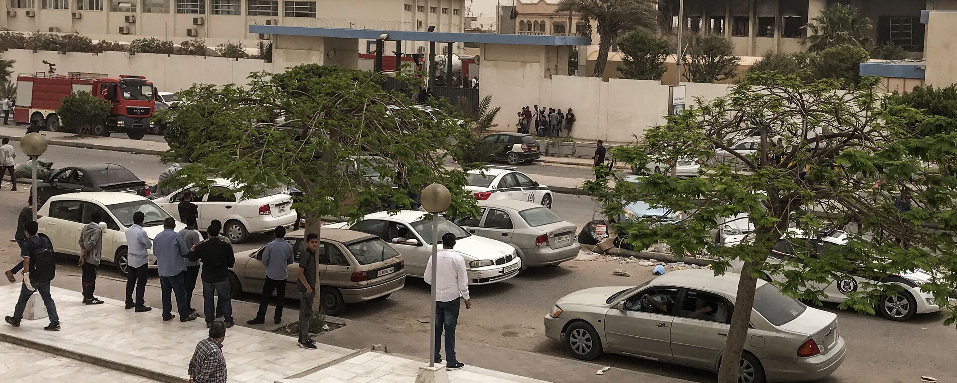 الهجوم الإرهابي على مقر مفوضية الانتخابات، بالعاصمة الليبية طرابلس - سبوتنيك عربي, 1920, 06.07.2021