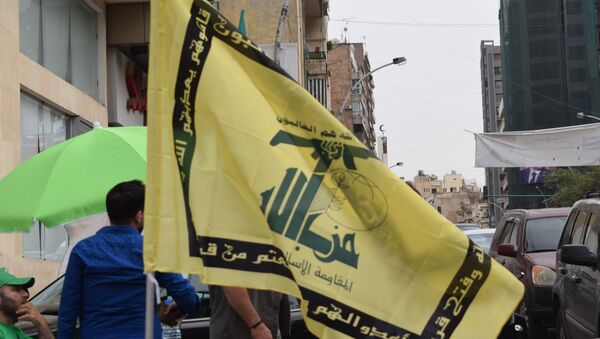 شعار حزب الله من الانتخابات النيابية اللبنانية - سبوتنيك عربي