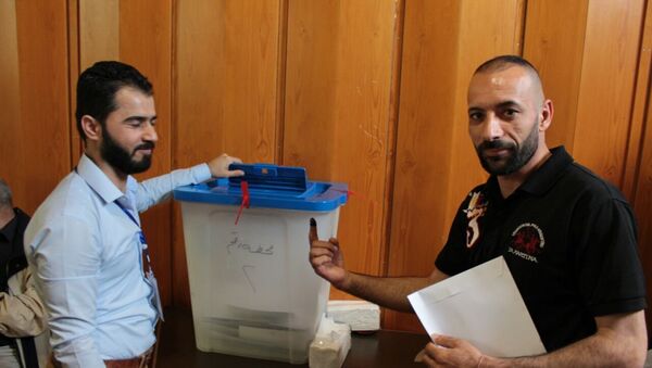 العراقيون في الخارج يدلون بأصواتهم في الانتخابات البرلمانية - سبوتنيك عربي